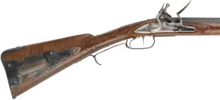 Virginia Longrifle
.54 caliber, 44" swamped barrel,
curly maple, hand forged iron trim with silver accents,
Chambers' lock, used, signed by David Kuyper